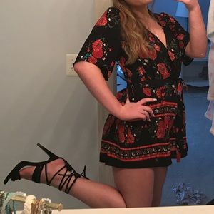 Super cute flower romper with open back and tie